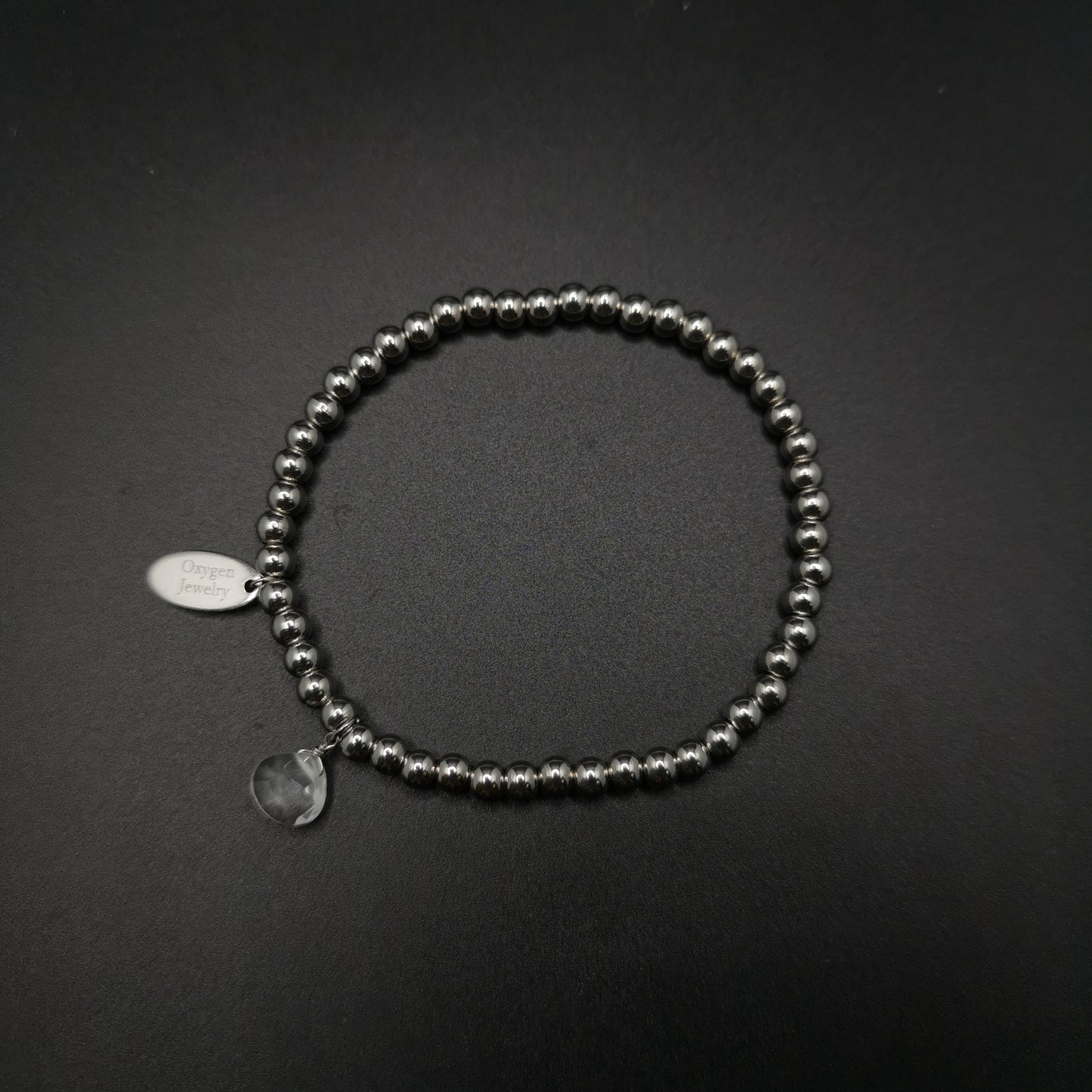 白水晶梨形切面金属珠弹性手链