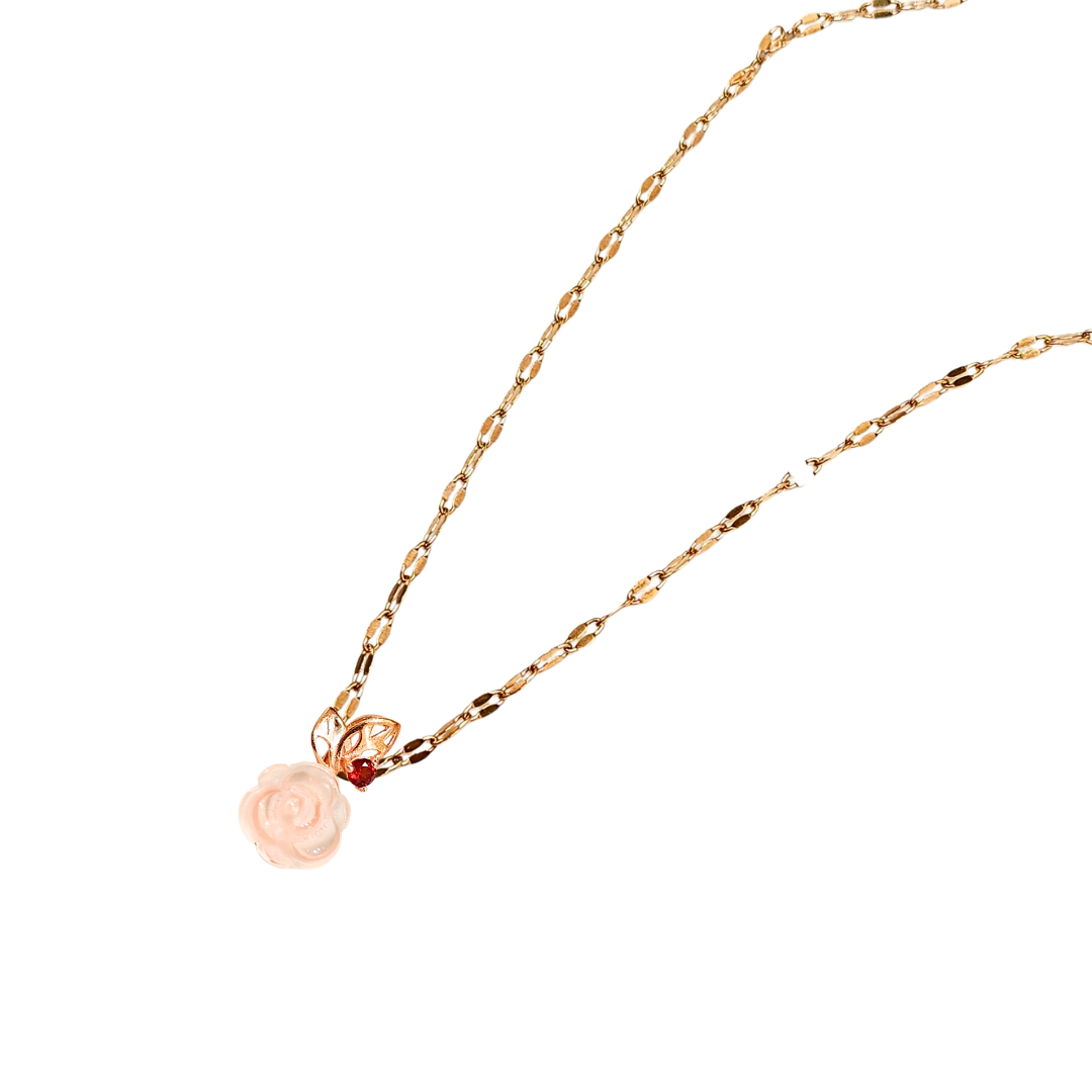 Three-dimensional rose quartz rose and garnet necklace