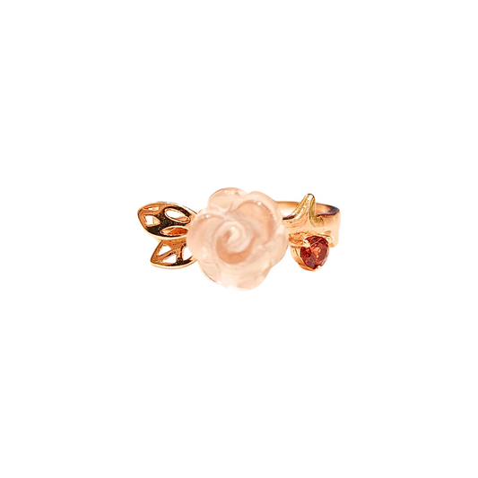 Three-dimensional rose quartz rose and garnet ring
